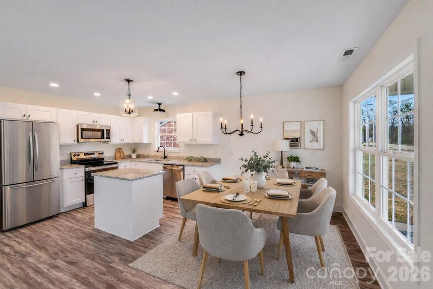 New construction in the heart of downtown Rock Hill! This thoughtfully designed 3BR/2BA home offers an open-concept layout with modern, neutral finishes throughout. The kitchen features white shaker cabinetry, granite countertops, stainless steel appliances, and a center island, opening to the living and dining areas for easy everyday living.

The primary suite includes a private bath and generous closet space. LVP flooring, recessed lighting, and a functional floor plan make this home comfortable, efficient, and move-in ready. Designed with low-maintenance materials and energy-conscious features, this home offers a great opportunity for buyers seeking new construction at an accessible price point.

Conveniently located near downtown, shopping, dining, and major roadways. Schedule your showing today! *Agent has ownership interest