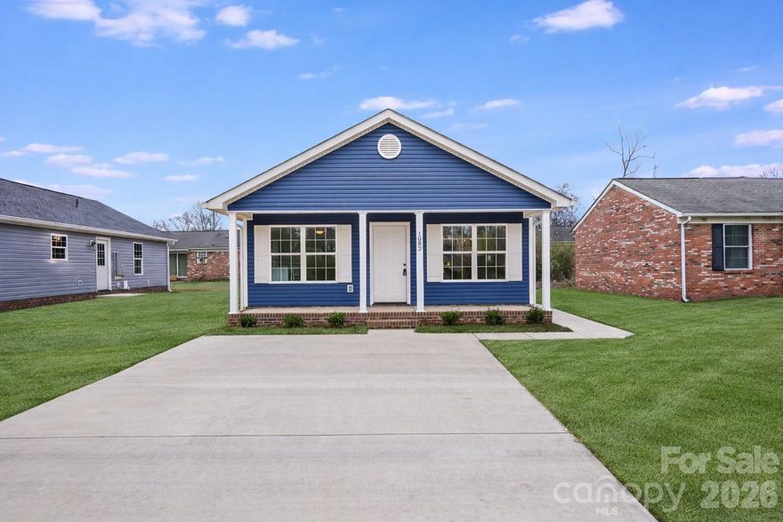 New construction in the heart of downtown Rock Hill! This thoughtfully designed 3BR/2BA home offers an open-concept layout with modern, neutral finishes throughout. The kitchen features white shaker cabinetry, granite countertops, stainless steel appliances, and a center island, opening to the living and dining areas for easy everyday living.

The primary suite includes a private bath and generous closet space. LVP flooring, recessed lighting, and a functional floor plan make this home comfortable, efficient, and move-in ready. Designed with low-maintenance materials and energy-conscious features, this home offers a great opportunity for buyers seeking new construction at an accessible price point.

Conveniently located near downtown, shopping, dining, and major roadways. Schedule your showing today! *Agent has ownership interest