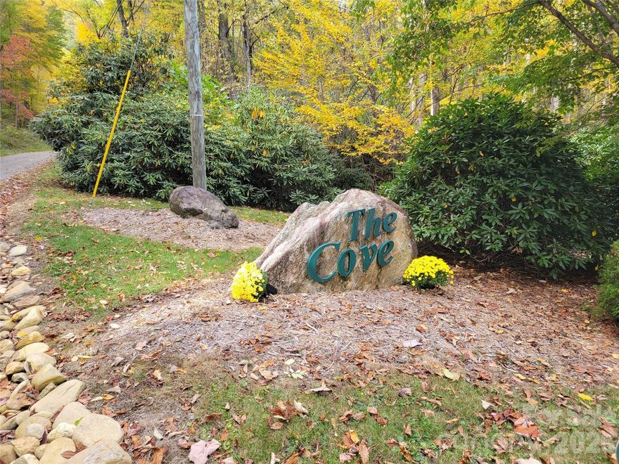 A stunning place to build your dream mountain home. .96 acres located in The Cove at Maggie Valley. Underground power lines, streetlights, paved roads. Community well. Easy access to Cherokee, Maggie Valley, Waynesville and the National Park.