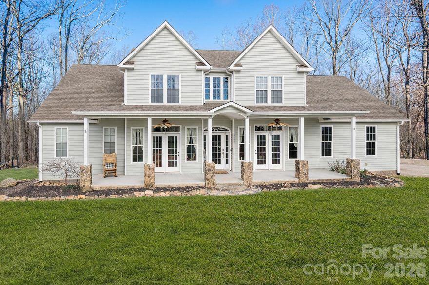 ***Temporarily off market due to icy driveway.*** This beautiful 4-bedroom, 3.5-bath home sits on 3.82 acres of wooded land, offering privacy and a peaceful setting. Enjoy relaxing on the covered front porch that extends across much of the home, with two sets of French doors along the front and matching French doors at the rear that open to an oversized deck overlooking the woods. Inside, the front entry is flanked by a home office on one side and a formal dining room on the other. The foyer leads into a stunning two-story living room featuring a gas log stone fireplace. The spacious primary suite is located on the main level and includes two closets. Also on the main floor is a large, open kitchen with a breakfast area, a walk-in pantry with ample shelving and cabinetry, a generous laundry room, and a convenient half bath. Upstairs you’ll find three additional bedrooms, two full bathrooms, and a bonus room. One of the bedrooms includes its own private bath, making it ideal for guests or a secondary suite. Home has a Kinetico water filtration system. Three-part system, iron filter, water softener and a neutralizer. Outside, the home is accessed by a private road with a shared driveway and road maintenance agreement in place. This cozy home offers space, privacy, and a setting where you can truly picture yourself settling in. Please note: a kitchen window has a broken seal, and there are some small holes in the vinyl siding at the rear of the home. Small refrigerator in bar area does not convey.