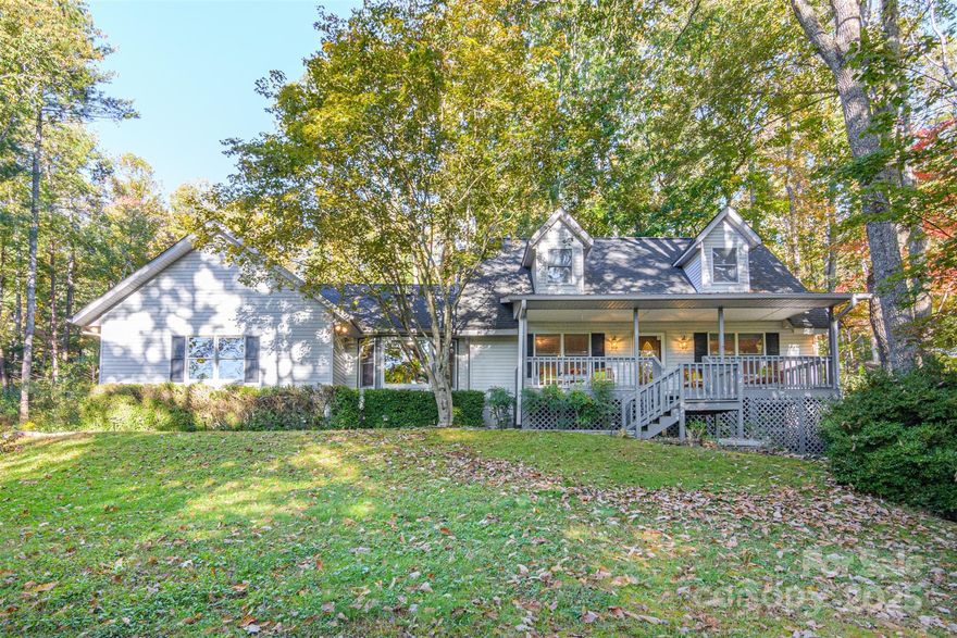 Welcome to Hidden Hills.  10 minutes from downtown Hendersonville. This home has been Meticulously Maintained, and has NO HOA FEES.  Notice the Pretty Hardwood Floors when entering the living room,  the Stacked Stone Gas Log Fireplace & Lighted Built-in Bookcases. The long screened-in back porch is a great place for coffee in the mornings.  If you have to work from home the Fast Fiber Cable Internet will come in handy. Quiet Neighborhood.
Large Private Owner's Suite has a Spacious En-suite with Double Vanity & plenty of room for two to move about comfortably.  Hang your bath towels on the Warming Rack before you enter the Custom Tiled Roll-in Shower.  There are 2 Large His & Hers Walk-In closets in the En-suite.  The Large Modern Kitchen has Rolled Black Marble Counter tops, Stainless Appliances and an Eat-in breakfast room off the kitchen with a Large Bay Window & views of the flower garden in the back yard.  This room could also be used as a sitting room or craft room as there is a Separate Full Dining Room off the Kitchen and Living Room area for entertaining.  Th Laundry room is off the Kitchen area as well.   Upstairs you'll find 2 Very Large bedrooms with Tons of Storage and a Nice sized shared Full Bath with Walk-in Tiled Shower in between.  There is another room currently being used as a sewing room- that is a flexible space which could be the perfect kids play room.  Home has been Meticulously Maintained. Driveway was refinished in August.   Roof is 6 years old.  There are 2 Heat Pumps, 1 is only one year old, the other is 6 years old.  Scheduled Termite service is maintained.  Gutter Guards Installed. Well pump replaced in 2015 & Pressure gauge in 2025. If you're looking for a comfortable quite home in the forest only 10 minutes on Good Roads into town, you need to see this home.  Driveway is steep, as are Many driveways in this neighborhood and WAS JUST REFINISHED THIS MONTH.  There is room for 2 cars to park in addition to the Large 1 car garage with Lots of storage space inside.  Schedule your showing today.