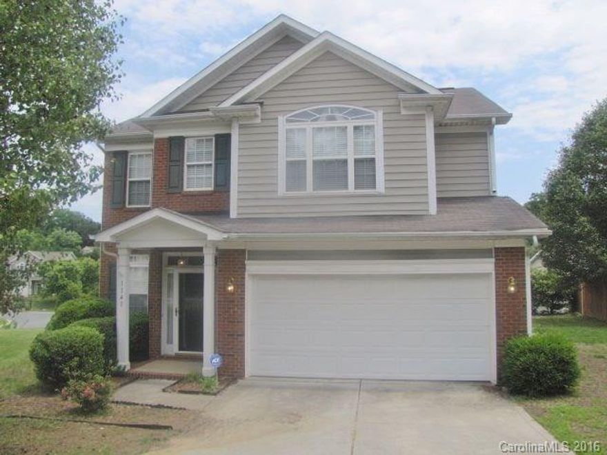 Home w/brick accents located on cul-de-sac, features wood laminate floors, crown molding and wainscoting. Double-sided fireplace w/columns divides LR and DR, and French doors access rear deck. Kitchen w/island opens to breakfast nook w/chair rail molding. All 4 BRs up, along w/laundry room. Master suite w/vaulted ceiling and large window for natural light, and private bath incl dual-sink vanity, soaking tub and sep shower. Minutes to I-85, w/easy access to Huntersville and Davidson via NC-73.