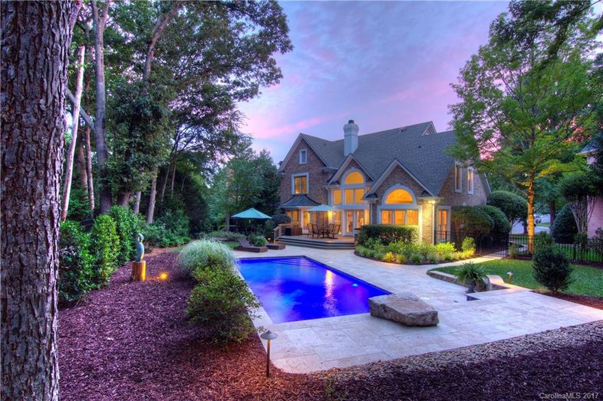 PRICE REDUCED TO SELL!  Gorgeous brick home in quite cul-de-sac, w/ breathtaking park-like backyard featuring Anthony Sylvan custom pool.  Perfect for entertaining... this sunny & bright 4 bedroom plus bonus home is the ideal floor plan for a family.  Enjoy the convenience of your master suite on the main level, overlooking the professionally landscaped & beautifully manicured yard from your private access to the deck.  Upstairs has stunning hardwoods throughout, Jack & Jill bath with granite.