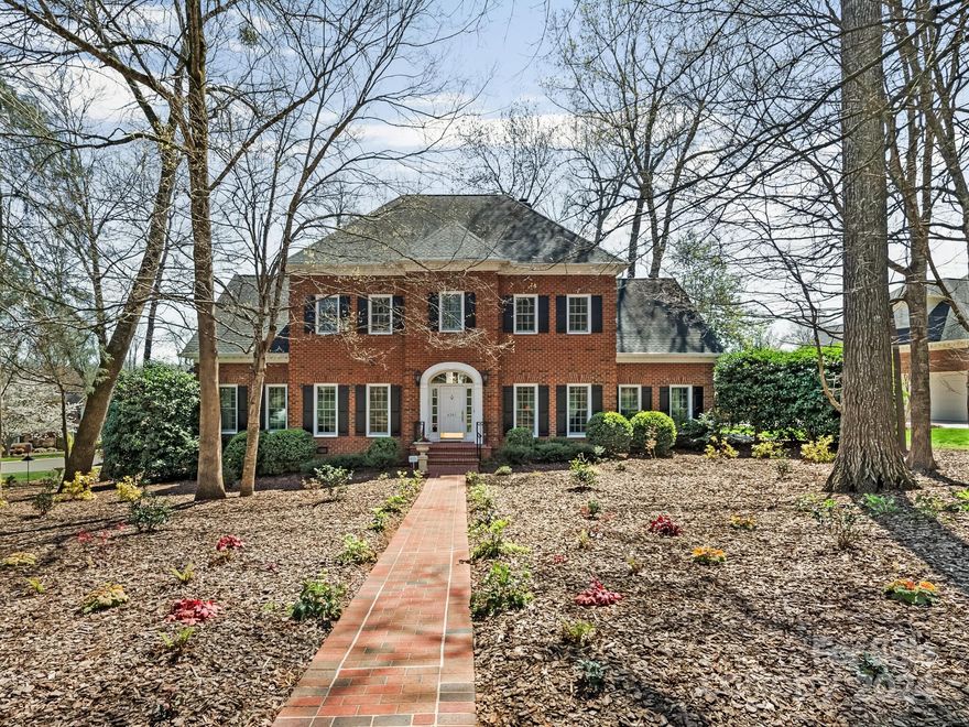 Stately two story brick home situated on a .55 acre corner lot in sought after McAlpine Forest. Beautiful foyer opens to all the down stairs living spaces including the living, dining and great room. The Great room features a beautiful fireplace and french doors which overlook the back patio and exquisite back yard. Open kitchen with sizable island as well as a breakfast room. Laundry room off kitchen with natural light. Primary down with two walk in closets. Nice size primary bath with very tasteful finishes. Upstairs includes three additional bedrooms and two full baths. In addition there is an over sized bonus room with tons of windows looking out to the back yard. Walk out storage is amazing no need to use the pull down! Back yard is a true treat from the back patio, to the amazing natural landscaping, an additional patio perfect for a fire pit, plus a beautiful koi pond. Property backs up to a cul de sac that can be accessed through rear gate. Two car attached garage.