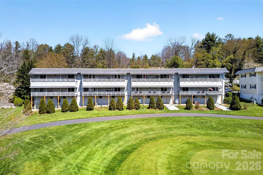 Welcome to effortless living on the Grassy Creek Golf Course—where convenience and lifestyle come together in one smart investment.

This main-level condo offers true ease of living—no stairs, no hassle, just walk right in and start enjoying your space. Whether you’re looking for a full-time residence, a mountain getaway, or an income-producing property, this unit is ready to meet the moment.

And here’s the part that sets it apart… a golf cart is included the sale price. Because what’s better than living on the golf course? Cruising it at sunset, heading to meet friends, or simply enjoying the lifestyle that comes with it. Even better—there’s dedicated golf cart storage underneath, making it as practical as it is enjoyable.

Inside, the unit is move-in ready with thoughtful features.  A cozy fireplace anchors the living space, creating the perfect spot to unwind. The kitchen offers not one, but two pantry areas—providing  valuable storage that makes everyday living or hosting that much easier.

Outside, the community continues to invest in itself—front trex decks have already been updated, and the back decks are next in line with a completed special assessment, giving you peace of mind and added value for the future.

Location only adds to the appeal. Just minutes from the iconic Blue Ridge Parkway, you’re perfectly positioned to enjoy some of the most breathtaking scenery in the Southeast—whether it’s a quick morning drive or a full day of exploring.