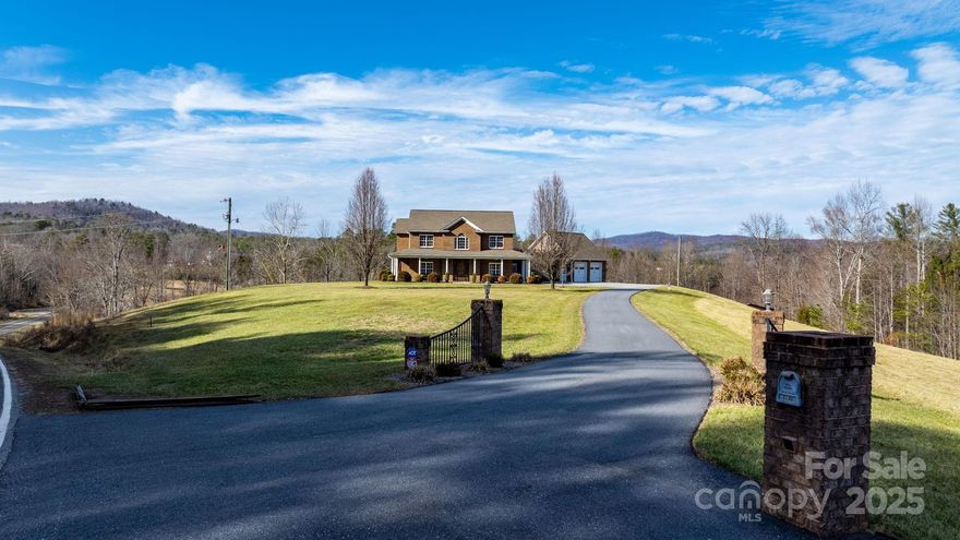 This executive brick estate on 2.5+ acres in Oak Hill offers beautiful mountain views & high-end amenities. A grand 17-ft foyer leads to an open floor plan w/a spacious great RM w/17 ft ceiling, gas log FP, & HW floors throughout. The main-level master suite boasts a walk-in closet, double vanities, a garden tub, & an oversized shower w/9ft ceilings throughout. The kit features granite countertops, SS appliances, a breakfast bar, instant hot water & a window overlooking wildlife. A formal Din RM, sunroom w/ gas FP & laundry/mudroom complete the main floor. Upstairs offers 3 bedrooms, 2 baths, & an office, plus a bonus room over the garage. The finished lower level is perfect for entertaining, w/ a rec area, wet bar, wood stove, full bath, & workshop w/ garage door access. Outdoor highlights include a large deck, detached garage w/ half BA, & a lean-to for extra storage. A tankless water heater ensures efficiency. A rare blend of space, luxury, & nature—don’t miss this exceptional home!