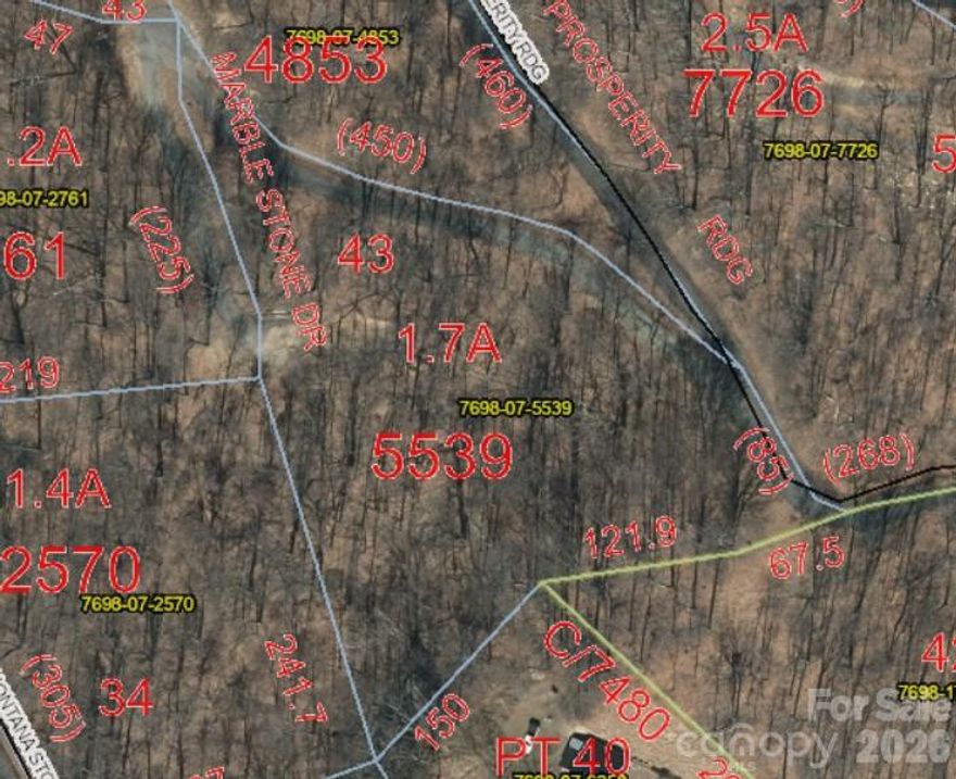 Beautiful building lot in the desirable Gated Community of Creekstone.  Mountain views with tree trimming, the lot is bordering a Cul De Sac at the bottom and Prosperity Ridge at the top.  Easy to build on with a drive already roughed in from the Cul De Sac.  Lot numbers are visible from the bottom & the top.  Current survey and lines clearly market on the lot.  Priced just over tax value.