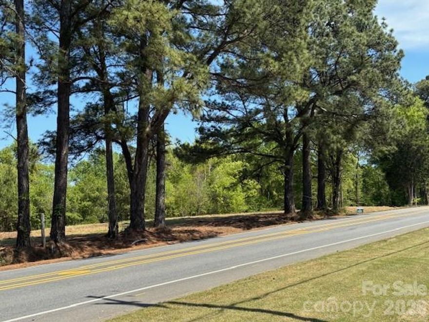 Lot 2 Ewart.  Prime Huntersville estate lot.  Bring your own builder.   Backs up to Northstone Country Club.   No HOA.   City water and sewer taps provided.  New park with walking trails, dog run and zipline planned nearby.  Convenient to Downtown Huntersville, Birkdale Village, Lake Norman, Uptown Charlotte and Charlotte-Douglas International Airport.  DOT is reviewing driveway options.