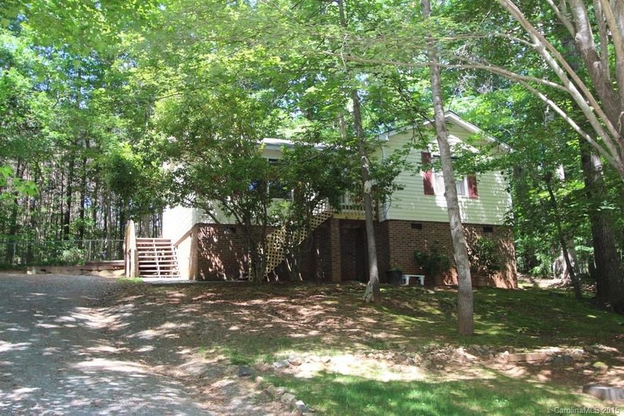 Adorable ranch with newly renovated kitchen is surrounded by mature hardwood trees. It is a 3 bedroom and TWO Full baths. The home sits on a hilltop. The sellers love their view and enjoy the abundant wildlife.   The crawlspace has a small workshop and lots of storage too!  The home is neat and move in ready! Seller provided home warranty. Roof just replaced. USDA Financing Eligible