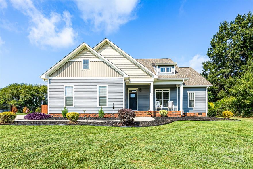 BACK ON THE MARKET! At no fault of the sellers, this little sanctuary is back on the market.  Welcome to 5533 Harvest Hills Rd! This 3-bedroom, 2-bath home on a .69-acre lot offers modern living with no HOA. Built in 2018, the open floor plan features a spacious living room with fireplace, gourmet kitchen with island, stainless steel appliances, and stylish backsplash. The private primary suite includes dual sinks, soaking tub, and separate shower, while two additional bedrooms provide versatility. Outside, enjoy a large fenced yard, deck, and room to grow, all with the freedom of no HOA restrictions. Located in the desirable and growing Harvest Hills community, you’ll be minutes from Crowders Mountain State Park, Bessemer City Park, Two Kings Casino, Veronét Vineyards, and downtown dining and shops, with easy access to Gastonia and Charlotte. Move-in ready and filled with charm, this property blends small-town serenity with city convenience. Long days on market reflect previous under-contract days (previous buyers were contingent on selling their home and could not ultimately close).  All items from previous repair request are already fixed, scoop up this deal today!