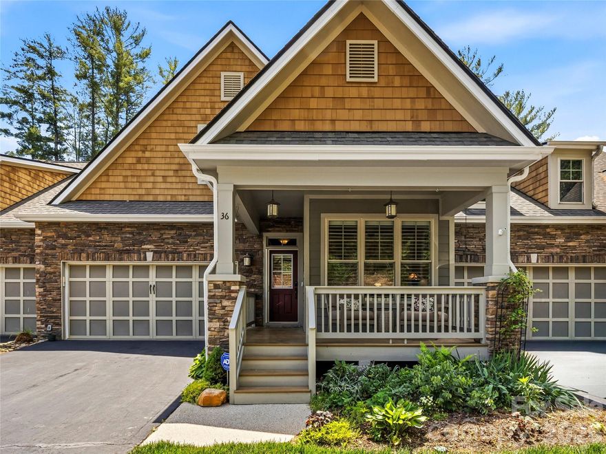 Tucked inside the sought-after gated enclave of Rockfish Cove at Biltmore Lake, this beautifully maintained Arts & Crafts townhome offers effortless mountain living with refined finishes and exceptional community amenities. Thoughtfully designed with a spacious open floor plan, soaring vaulted ceilings, and abundant natural light, the home combines comfort and style in every space. The main level features easy everyday living with a desirable primary suite, warm wood flooring, and an inviting living area ideal for entertaining or relaxing by the fireplace. The kitchen opens seamlessly to the main living spaces, creating a natural gathering place for family and guests alike. Step outside and enjoy peaceful views from private outdoor living spaces surrounded by the beauty of Western North Carolina. Exterior maintenance and landscaping are handled for you, allowing more time to enjoy everything Biltmore Lake has to offer. Residents enjoy lake access, miles of scenic trails, boating, fishing, tennis, recreation areas, and a vibrant community atmosphere — all just minutes from Asheville.  Experience low-maintenance luxury living in one of Biltmore Lake's most desirable communities!