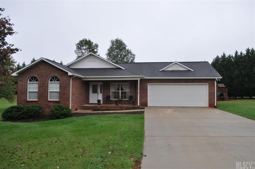 Beautiful home in Eastern Burke County with great access to interstate. Enter into this one level brick ranch and feel welcomed. Plenty of space inside and out with natural light flowing throughout. The Living Room is accented with a wooden surround fireplace to add warmth to those cool days and cathedral ceiling to catch the glow of the fire. The Master Bedroom includes Master Bath with a double sink vanity and two large closets. The Front Bedroom has 2 large, arched windows with a view of the front and the other bedroom has a side view of the property. What better way to entertain family and friends than in a large Kitchen/Dining Room with lots of cabinetry and counter space and plenty of room to move. Enjoy meals inside or outside on the patio with a view of the property. Home has double car garage and a Home warranty.