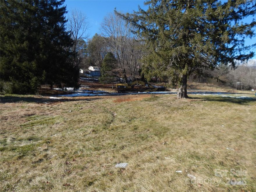 Corner Commercial property on East Main street Sylva NC in High visibility and High traffic flow location. The property adjoins 3 other parcels for sale at 1552 East Main. Total acreage available is 1.98 acres for all 4 contiguous parcels with city water and sewer available....Zoned B3..