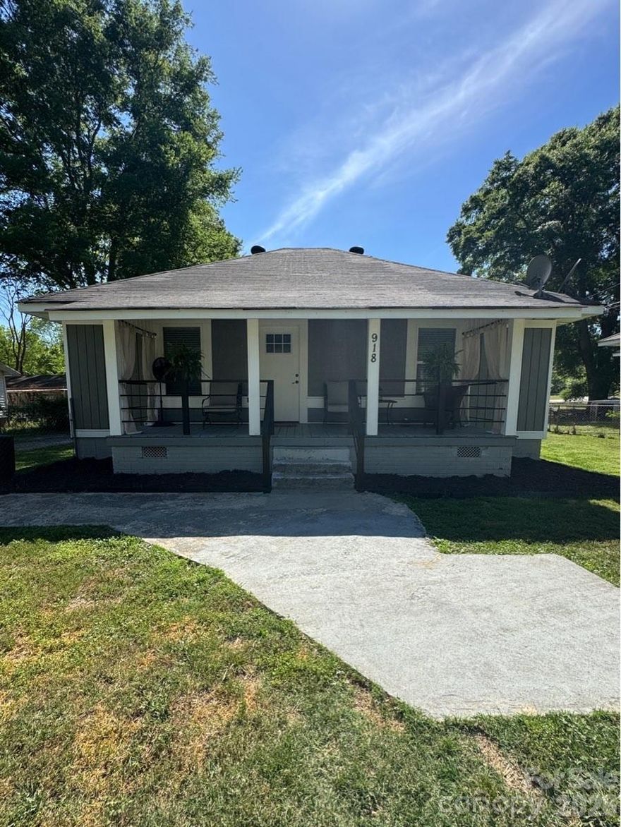 Move-in ready and fully renovated, this charming Arts & Crafts-style home is just minutes from downtown Lancaster and packed with modern upgrades. Featuring 2 bedrooms, 2 bathrooms, and over 1,100 square feet of single-level living, this home offers both style and functionality.

The open-concept layout creates a bright, airy feel, seamlessly connecting the living room and kitchen—perfect for entertaining. The kitchen is the heart of the home with a large island, updated appliances, and modern finishes, all complemented by durable luxury vinyl plank flooring throughout.

The primary suite provides a private retreat with a walk-in closet and full bath, while the second bedroom is ideal for guests or a home office. A dedicated laundry room adds convenience.

Outside, enjoy a covered front porch and a large, fenced backyard with a level lot—perfect for outdoor living, pets, or future customization. All located near shopping, dining, and just a short drive to Charlotte via Hwy 521!