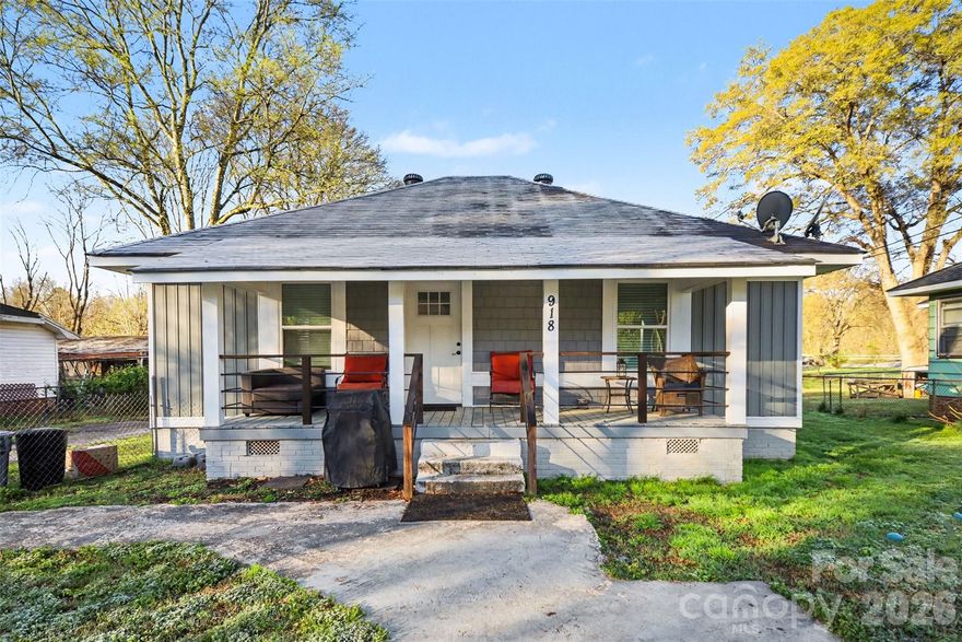 Fully renovated Arts & Crafts-style home located just minutes from downtown Lancaster. This charming 2-bedroom, 2-bath home blends classic character with modern updates and offers over 1,100 square feet of comfortable single-level living.

Inside, you'll find an open floorplan connecting the living room and kitchen, creating a bright and welcoming space ideal for everyday living and entertaining. The kitchen features a large island, modern finishes, and updated appliances, while luxury vinyl plank flooring runs throughout the home for durability and easy maintenance.

The spacious primary suite includes a walk-in closet and private full bath, while the second bedroom is generously sized and located near the second full bathroom—perfect for guests, family, or a home office. A separate laundry room adds convenience and functionality.

Outside, enjoy the charm of the covered front porch, perfect for relaxing evenings. The property also features a large fenced backyard with a level lot, providing plenty of space for pets, gardening, or outdoor gatherings.

Conveniently located near downtown Lancaster, you'll enjoy easy access to local shops & restaurants including Enzo’s, 521 BBQ, Daily Grind Coffee Shop. With quick access to Hwy 521, commuting to the greater Charlotte area is simple.