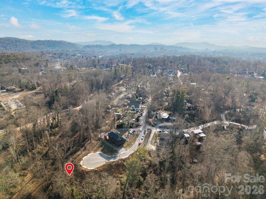 Rare opportunity to build in a new cul-de-sac location within the walkable Montford neighborhood just 1.5 miles to Downtown Asheville! Beautyberry Circle is a small subdivision consisting of 9 total lots that have been prepped with utilities and driveway aprons already in place. Convenient and sought-after area, just a short stroll to three popular neighborhood restaurants. Montford has 3 neighborhood parks, tennis/pickleball courts, and a community center.  See attached plat and CCRS.