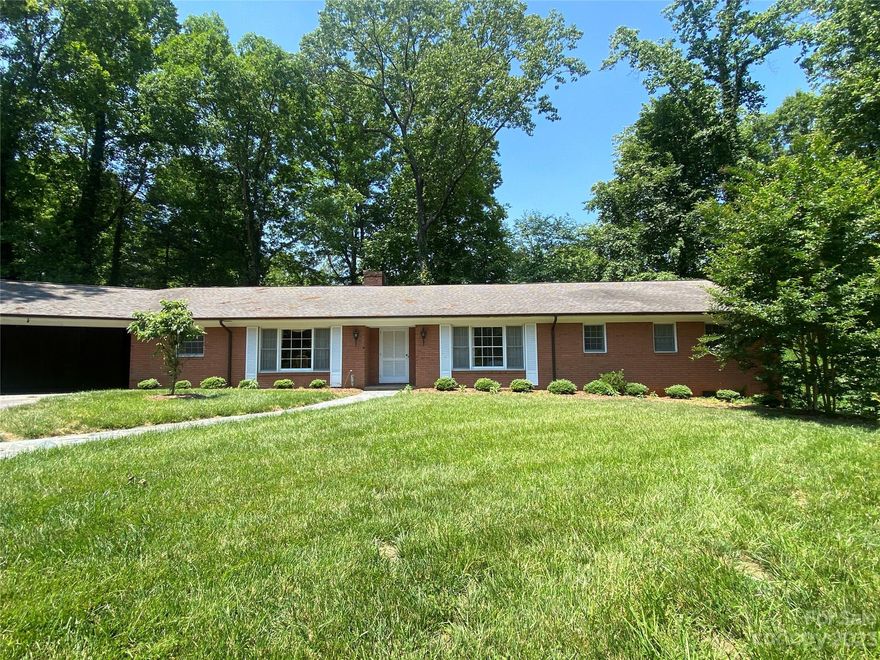 Nestled at the end of Woodbine Terrace, this beautiful home is located in one of Morganton's most established neighborhoods. This brick home offers one level living, a balanced floor plan and much more. Tons of square footage to offer you plenty of potential options for family enjoyment or entertaining guests. Huge rooms! Lots of built ins and storage that provide maximum use of the space.