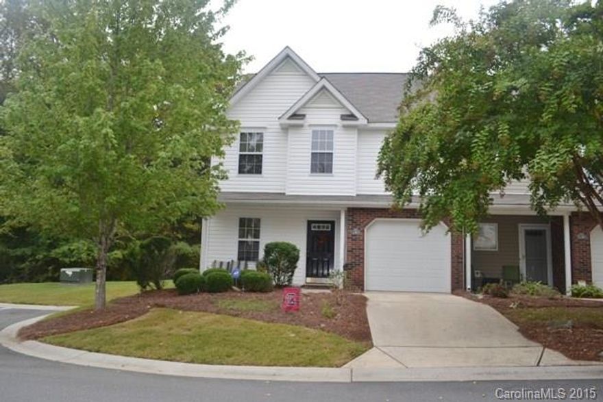 Beautiful end unit with rocking chair front porch! Tons of counterspace in kitchen with breakfast area. Tons character and square footage! Spacious bedrooms with master bedroom on the main. Community pool and easy access to I77!