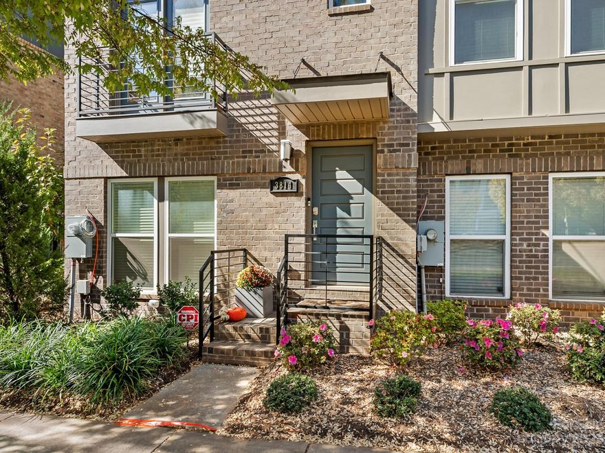 Beautiful end-unit townhome located in Lower South End's gated South Village community! A two-car tandem garage with storage on first level, and open concept kitchen and living space on the main level. The upper level features the primary bedroom and secondary bedroom, each with en-suite baths. The top floor could be used as a bonus space or a third bedroom with a full bath and rooftop terrace. Close to the LYNX light rail Scaleybark station and all that South End and LoSo has to offer!