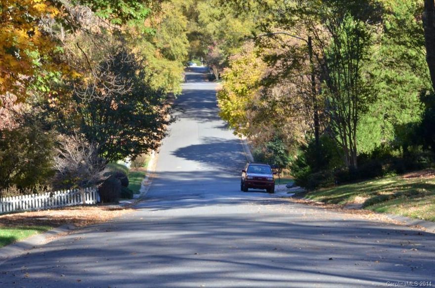 Dream LOT for your Dream Home.  Unique opportunity to acquire a quiet wooded lot on cul-de-sac in Usher Estates. Walk into the Cloisters, backs up to Huntington Park Drive.  Best schools and convenient to Uptown and Southpark.  There are not many lots left like this one in Charlotte so move fast.   City water and city sewer at street.  (No tap fees have been paid.)  
Feel free to walk the lot and bring your builders.