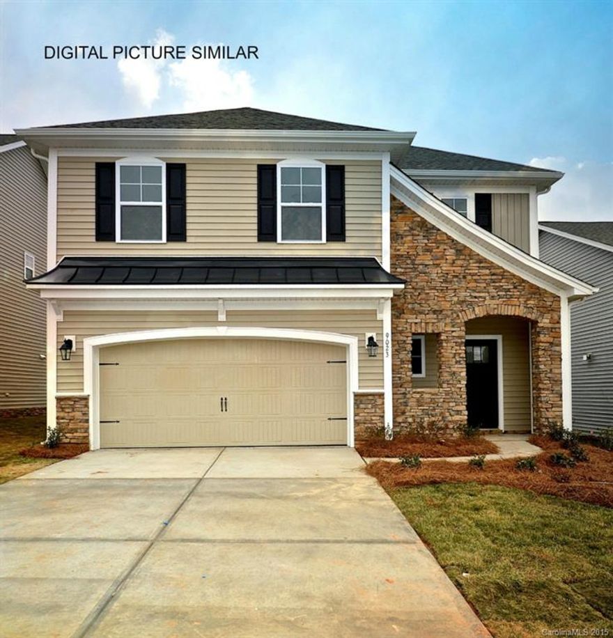 This home has an expansive first floor-Room for everyone! Huge Cooks Kitchen w/stainless appliances, staggered cabinets, tile backsplash & granite countertops - 14 ft breakfast bar - room for 5 barstools!  Hardwood floors throughout the first floor and heavy moldings (Crown/Base board/Cased windows & chair rail-Picture Frame) Generous master bedroom w/oversized closet and master bath w/separate tile shower(double sided glass) and oval soaking tub. 4th bedroom can double as a bonus room. WOW!