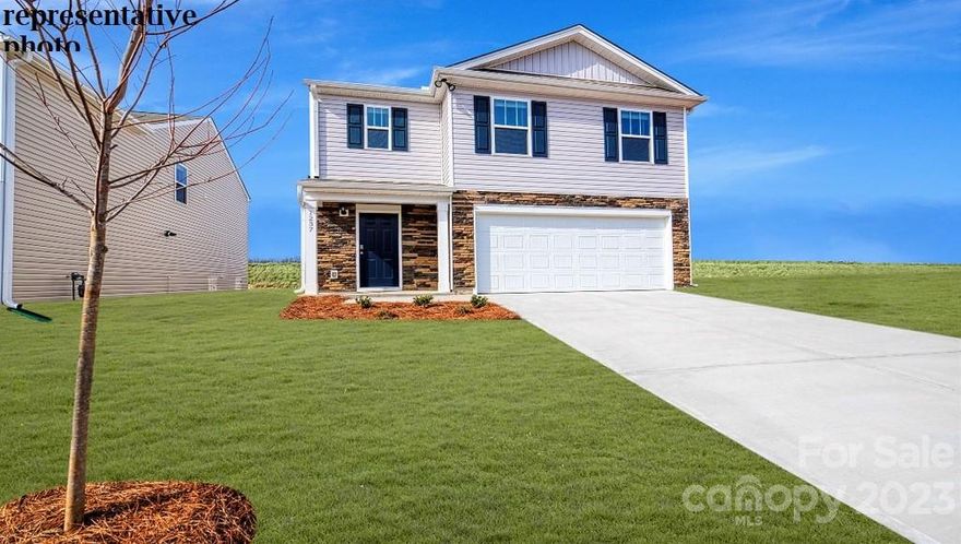 WOODED LOT!! Stylish White kitchen cabinets compliment the granite counter tops.  Stainless steel Gas Range, microwave and dishwasher are included. Family room features cozy fireplace with mantle.  Upstairs is the laundry room, primary BR, hall bath and total of 4 bedrooms - and this home features a Guest BR/full bath on main level, bath with dual sinks, linen closet and 5 ft. shower and walk in closet. Exceptional floor plan in brand new community. Home Is Connected Includes programmable thermostat, Z-Wave door lock and wireless light switch, touchscreen control device, automation platform, video doorbell, and Amazon Echo Dot!  All home features are subject to change without notice. Internet service not included.  Community will include playground & Pavilion in the main common area.  Photos are representative and do not include all features. Ready for June close!