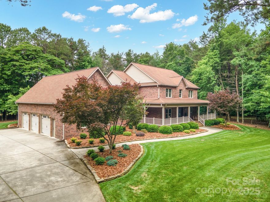 Custom built in 2007 this beautiful home is nestled on just under 11 acres within a farm preservation buffer zone. Enjoy countryside living with the added benefit of county taxes only. A heated and cooled shop offers the convenience and space for an office or additional storage.

Enjoy the sights and sounds of nature with a wrap-around front porch. As you enter the home a two story foyer splits the formal living and dining areas. The two story great room features a custom built-in entertainment center with lighting, 65" tv, and surround sound. The primary suite on the main boasts a fully remodeled bathroom in 2024 and two walk in closets. The kitchen flooring, lighting, dishwasher, and refrigerator have just been updated in 2024 including freshly painted cabinets.

Upstairs are 3 bedrooms, a rec room, bonus room, and a fully equipped home theater system showcasing 8 reclining seats, 110" screen/projector, surround sound and zone lighting. See attached features list for more info!