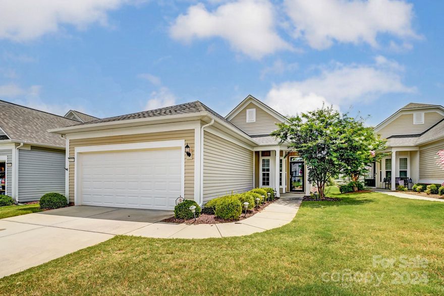 Beautiful 2 bedroom, 2 bathroom home located in the highly sought after Carolina Lakes 55+ community! Enclosed 4 seasons room and additional extended outside paver patio that overlooks a spacious backyard. The kitchen offers a gas range, granite countertops, and plenty of cabinets. This home is move in ready with fresh paint and new carpet!