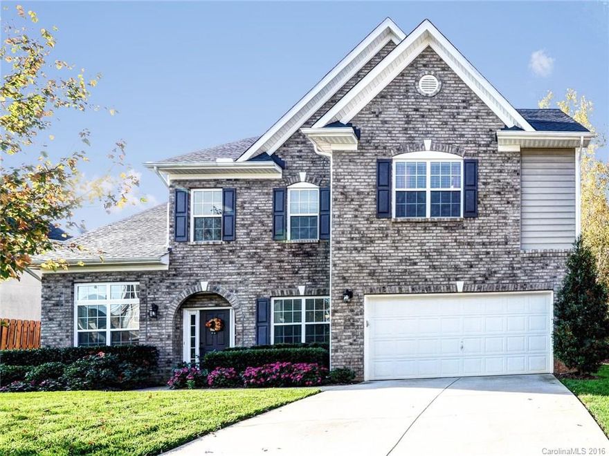 STUNNING 3519 sq. ft home in Mill Creek Falls! Upgrades GALORE! Imagine evenings in the fully landscaped yard w/ pergola, patio, IN-GROUND IRRIGATION, & shade trees for privacy. Downstairs features coffered ceilings, TWO gas fireplaces, hearth room, TONS of cabinet space, HUGE island, gorgeous granite counters, laundry room with utility sink & drop zone off garage. Upstairs features extra large bonus room, master suite w/ tile shower, jetted tub, separate sinks, and walk-in closet. $91/sq ft!!!