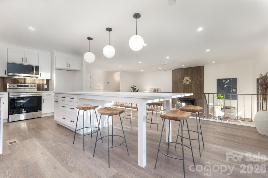 A spacious ranch home with a large, open concept kitchen featuring a brand new kitchen, plenty of counter space and huge center island perfect for entertaining. The living area with a cozy fireplace has large doors/windows that let in tons of natural light.  The sun room right outside the kitchen offers more dining area with gorgeous view of the golf course. Completely renovated bathrooms with designer picked tiles. Extra storage space at the back of the house. Updated bathrooms features sleek, modern vanities and elegant tile work. It is definitely a blend of comfort and luxury!