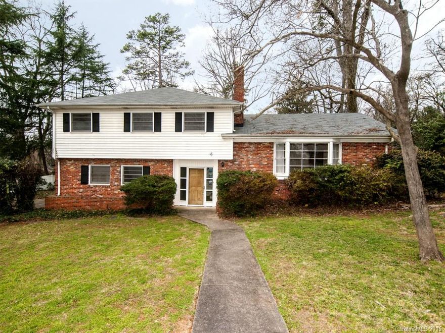 Fantastic neighborhood and quiet street.  Home needs work but has loads of potential.  Large rooms and quaint features.  Slate entry and living room has bay window and fireplace.  Hardwoods throughout, large paneled rec room in basement, and lots of windows. Private, level yard.  Come see!