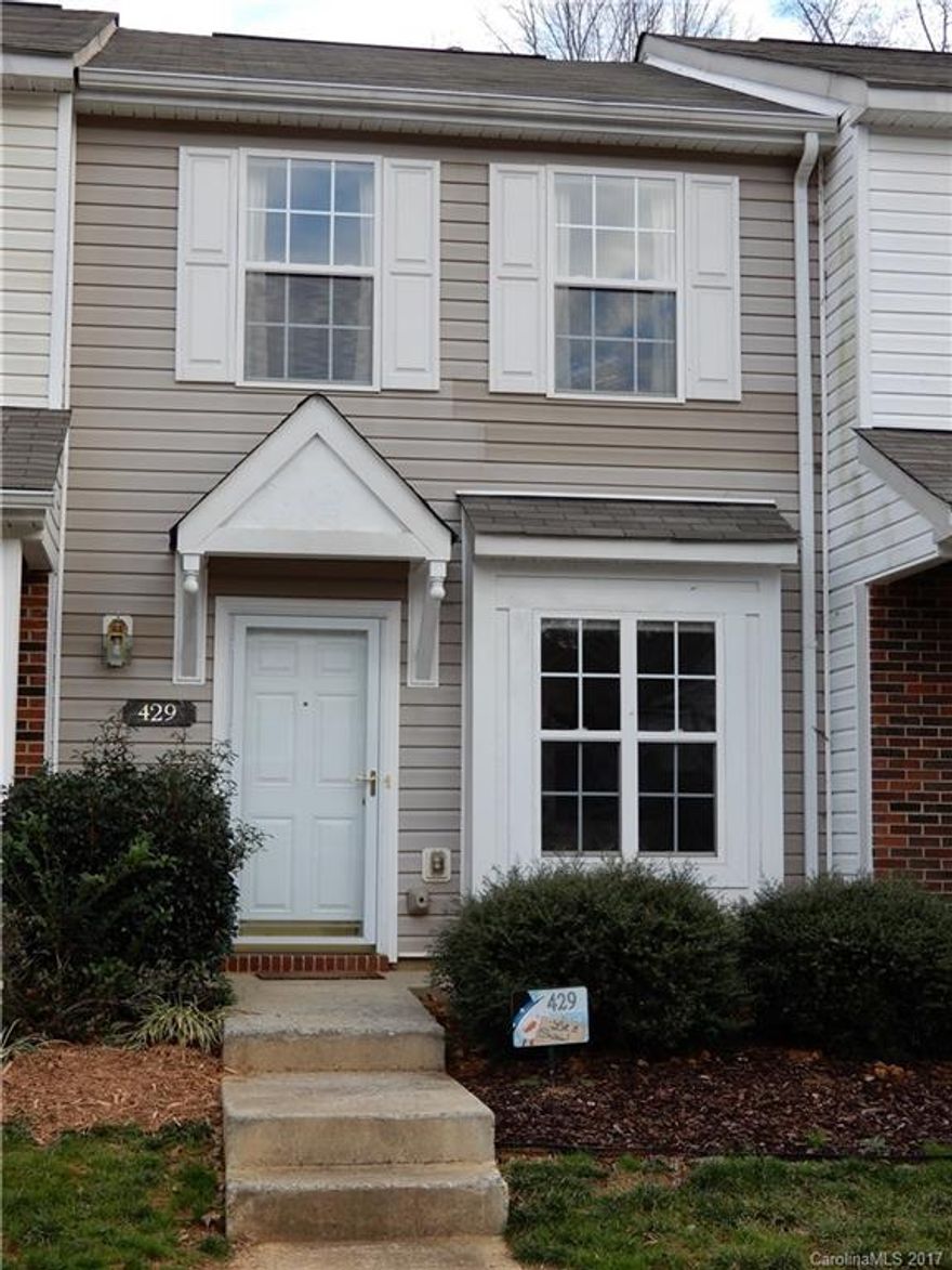 Stunning townhome with amazing tile floors throughout the main level which appear to be wood! Gorgeous! Kitchen totally renovated. Cabinets and appliances have been replaced. Enclosed patio in back facing beautiful woods. Storage room off patio. Hardwood flooring in upstairs hall and second bedroom (now being used as an office). Master bedroom has brand new carpet. Both bedrooms feature vaulted ceilings. Refrigerator, washer & dryer, and most furnishings remain! Move in ready! New roof 2016.