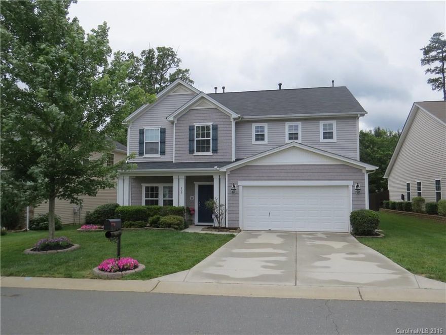 HGTV-worthy gorgeous home with neutral colors throughout.  Experience the jaw dropping magic of custom home theatre room or use it as a fifth bedroom.  9 foot ceilings on first floor, drink coffee gazing out the bay window in the kitchen at your very private back yard sanctuary with organic raised garden beds.  Don't settle for cookie cutter, extensive crown molding and beautiful hardwoods break the mold of builder basic.  Entertainers delight  with a gourmet kitchen complete with large island.