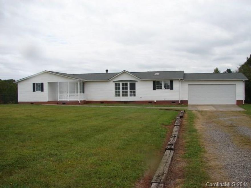 New carpet throughout, freshly painted interior, new front porch railings, new kitchen cook top, new roof. All inspections in attachments.  This is a R-Anell triple-wide home, owned by Freddie Mac and subject to First Look through 10-15-14.