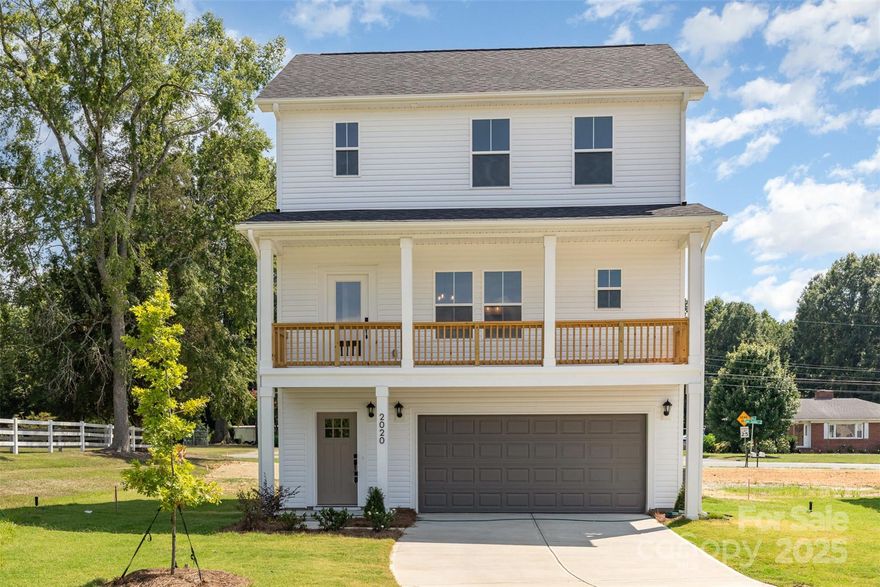 $10,000 in closing cost credits with preferred lenders. OPEN FOR PUBLIC TOURS: Saturday (10-6) & Sunday (1-6). Last Banyan now available in Sadler Village! The brand-new floorplan includes 3 bedrooms, 3 full baths, exterior deck off of the living room & double-car garage. Gorgeous SPC flooring throughout main floor seamlessly connects living, dining & kitchen areas. Beautiful exterior deck off of the living room. Kitchen features soft-close, dovetail shaker cabinetry & quartz countertops paired with tile backsplash that shines next to the stainless-steel appliances. One bedroom & full bath on main floor. Primary suite, another bedroom & 2 more full baths located on the 3rd floor! All full bathrooms have beautiful quartz countertops atop shaker, soft-close cabinets & framed mirrors. The practical third floor laundry room boasts a recessed dryer vent. Sadler Village is located just 10 minutes from Charlotte airport & 15 minutes from Uptown. Ready in January 2026!