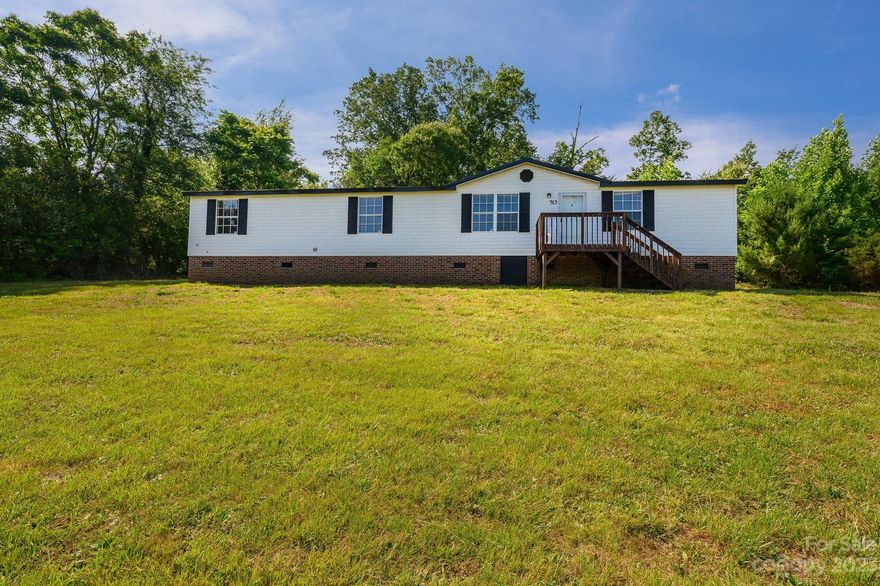 Gorgeous Country Setting - This home is situated on 1+/- Acres in Bethlehem Min to 127, Rink Dam, and Granite Falls! Large Floorplan includes 1792 Sqft - 3BR/ 2BA- Living Room, Dining Area, Large Kitchen, Den - Split Bedroom Plan and Primary Suite with Separate Tub and Shower. The home has been freshly painted through out and the seller is offering a $5000 Flooring Allowance with Acceptable Offer!!!!