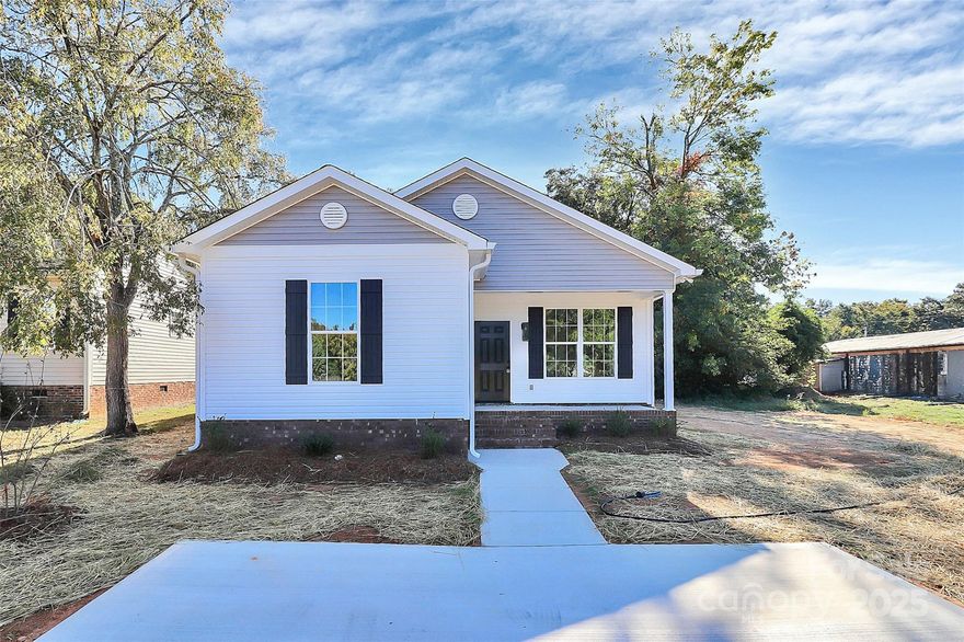 Almost Complete!!  Updated Construction Photos as of 9-12-25! Beautiful front porch to enjoy your morning Coffee! Walk onto Designer NEW LVP flooring throughout. Spacious Great Room & Dining Area perfect for entertaining! Kitchen is AWESOME w/white shaker cabinets, granite countertops, and NEW SS Appliances! Primary Suite is a DREAM featuring DUAL walk-in closets, Dual granite vanity, and a huge garden tub/shower combo! 3 Guest Bedrooms are good size and all feature standard closets. The additional full bath in the hallway features a w/single granite vanity and tub/shower combo. 4th Bedroom is small but perfect for a home office or gaming room for the Kids! Parking is dependent upon final grade. It will either be concrete driveway or concrete parking pad. This space will be big enough for 2 cars to park. Where the Parking with be is up to the Final Grade and lot set-backs. This home will have a Patio or Deck, it depends on Final Grade. The Seller is added a 6FT Wood Privacy Fence in the Backyard!!Come see this one today!