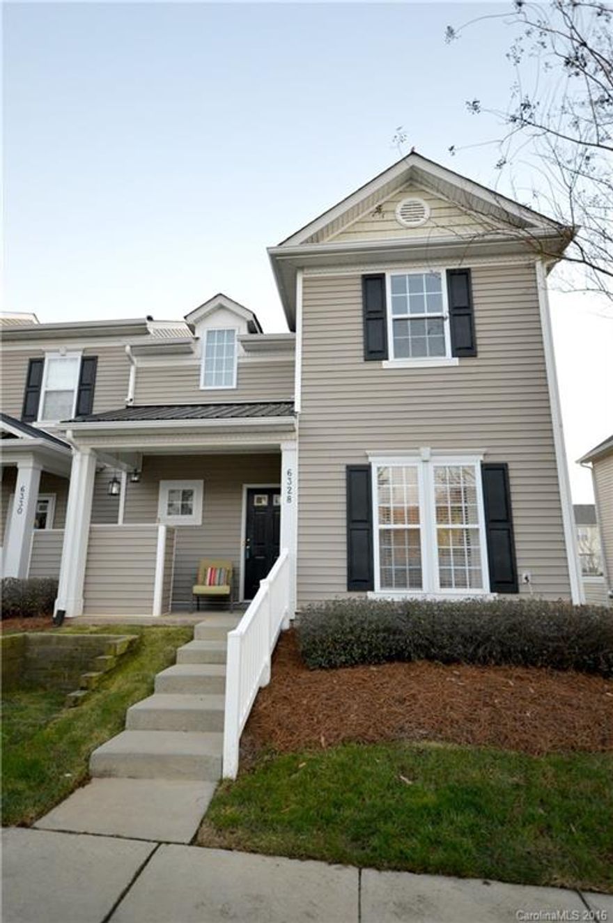 End unit with master down. Shows like a model home. Updated kitchen, beautiful new laminate floors, new stove and mircrowave, new cabinets, freshly painted. 2 store great room with tons of natural light. 2 additional bedrooms and loft area upstairs. Great community near shopping and only a few miles from Ballantyne.