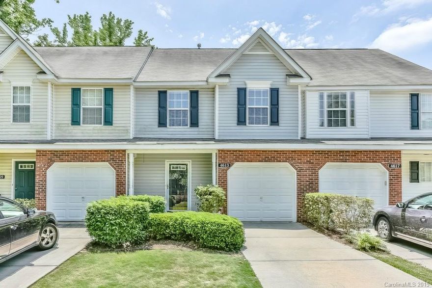 Mint condition townhome in Covington at Providence - easy access to uptown & I-485.   Main level hardwood floors & freshly painted walls; huge walk-in crawl space for storage; Maytag kitchen appliances include electric stove & dishwasher; Breakfast bar & prep. island; Great room w/gas log fireplace; Two large bedrooms, each with private bath & walk-in closet; Blinds on windows throughout; Master bath with garden tub; Deck with stairs to backyard & unfinished storage; Community pool & clubhouse.