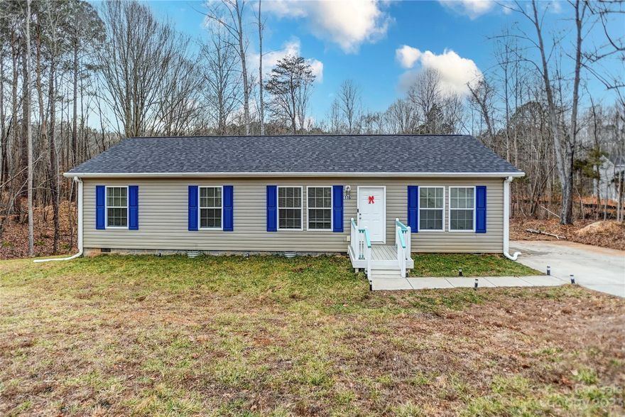 Great lifestyle in this charming home near to Lake Norman.  Start with the great location just seconds from Skippers Cove to put in your boat, & minutes from two other lake access areas. Immaculately maintained one story off frame modular home in desirable Brook Creek Cove.  You don't want to settle for new construction on a tiny lot where you're right up next to your neighbor?  This lot is 1.3 acres including open yard & woods behind.   Check out these gorgeous photos. 3 Bedrooms, 2 full baths, open floorplan with both den and living rooms.  Split bedroom plan.  Well designed appointments go together & show well. Rocky Creek Cove is a great community with large yards.  Close to Lake Norman State Park for water sports, hiking, biking, camping, and community events.  Central in Iredell County near to the growing town of Troutman.  Iredell Statesville schools including South Iredell High with the prestigious IB Program.  Located between Mooresville and Troutman and everything you need.