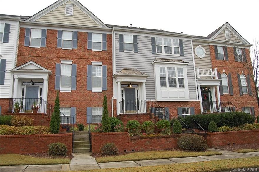 You are going to love this one!  3 story townhome featuring  2 owner suites w/ walk in closets, tray ceilings and garden tub. Spacious island kitchen w/solid surface, stainless appliances and pantry. Living room w/ fireplace gas logs, dining area w/beautiful molding. Hardwood on the main level ,brand  new carpet  and freshly painted throughout.  Lower level guest suite/office w/ private 1/2 bath . 2 car attached garage w/addit. storage.  Walking distance to Ballantyne Commons and community pool!