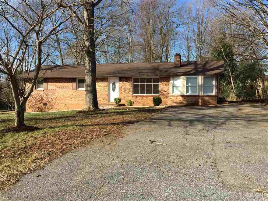 Rare find!  This all brick ranch on almost half an acre has recently gone through an extensive renovation making it a like-new beauty.  The kitchen has been completely remodeled with new cabinets, countertops, appliances, sink, disposal and tile flooring.  A shower and new fixtures were added to the master bath, new carpet in all bedrooms, new light fixtures and ceiling fans throughout and newly painted as well.  Yard has mature trees and a rear deck to enjoy your time outdoors.  Hardwood floors and brick fireplace are found in the formal living room and a large family room is perfect for relaxing!