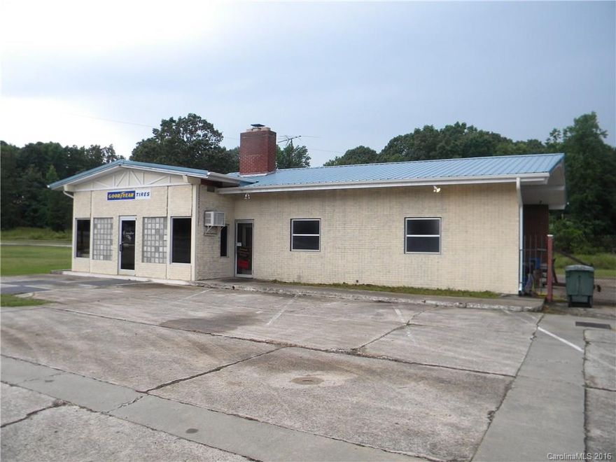 Tire store with three roll up doors and plenty of office space.  This property has 3.5 acres that can be parceled off.  Great for Automotive store, garage, or enough land for low impact options such as storage units.