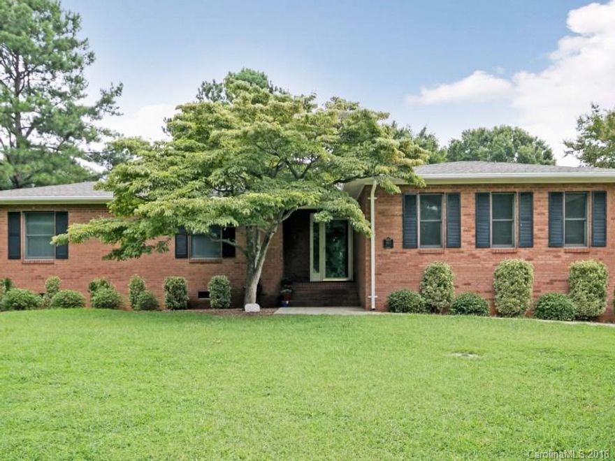 Wonderful updated all brick ranch home on large corner lot! Interior Freshly painted, NEW Carpet! Spacious family room w/ masonry fireplace & ceiling fan. Great eat-in Kitchen w/ tile floor, good cabinet space & access to family room. Master BDRM features his/her closets, ceiling fan & full private bath. Nice secondary BDRMs w/ ceiling fans. Large patio to enjoy outdoors! Over half an acre lot! Quiet Neighborhood. Convenient location close to shopping, parks, walking trails & the highway!