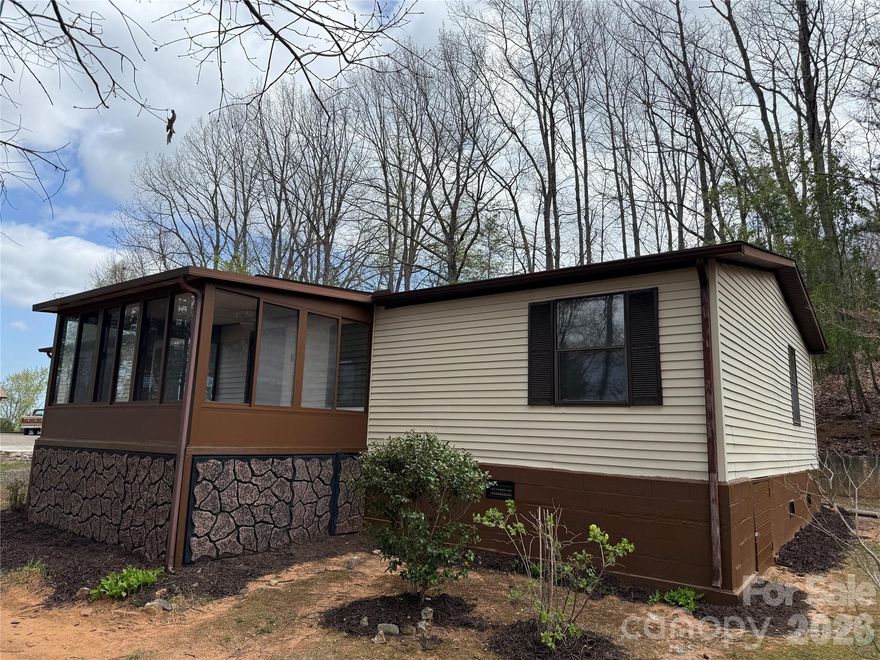 Great investment opportunity!  This property features a 3-Bedroom 2-Bath manufactured doublewide home, and a separate 2-Bedroom 1-Bath site-built home with a metal roof and full basement on a spacious 1-acre lot.  The manufactured home features a large, open-concept kitchen and living room, separate family room, and an attached sunroom.  A large deck and detached carport truly make this a great property!  The charming site-built home features a functional layout and great views.  Live in one home and use the other for additional income, or use both homes for rental income.  The choice is yours!