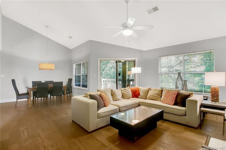 Updated third floor condo in the heart of South Park! This open floor plan unit features vaulted ceilings, large living area with wood burning fireplace and two split bedrooms. Recent updates include new hardwoods, fresh paint in neutral grey and removal of popcorn ceiling. Large outdoor living area with balcony nestled in the trees and exterior storage closet.