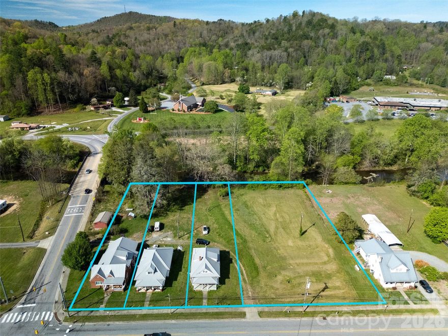These three homes and an adjacent vacant lot, located on Main St and the French Broad River, offer a number of possibilities. Totaling over two acres, and unrestricted, the properties can be renovated, developed, and used for residential or business purposes. Multifamily units are also a possibility. There is no shortage of charm, character, or history in these long standing homes and close proximity to Brevard, Lake Toxaway, and Cashiers make it an ideal location. With loads of potential, come and take a look at this unique opportunity on the beautiful French Broad River.