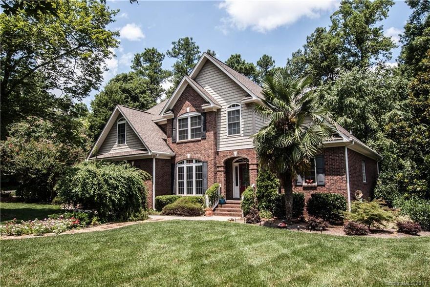 Beautiful open concept home close to Lake Wylie. Features open kitchen to vaulted keeping rm, ss appliances, gas stove. All Hardwood flooring throughout entire home. 2 story living room. Master suite w/ separate tub/shower, tray ceiling on main. Bonus upstairs. Jack & Jill bath. Tankless hot water heater. Very private back yard which extends way past fence. Expansive deck overlooks landscaped fenced yard. Large lot w/ winter views of Lake Wylie. Not far from boat landing. Clover school district.