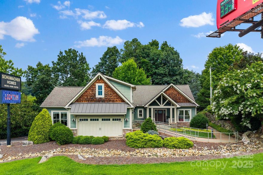 Ideally positioned with excellent visibility from I-26, this +-6400 SF office/showroom building offers versatile use options and a great overall value. Previously used as a homebuilder's showroom and offices. Encompassing 3 levels, the spaces offers a versatile layout with abundant natural light. Multiple private offices, a spacious conference room, reception areas, showrooms, a full model kitchen, luxurious bathrooms, and storage spaces all contribute to a professional and efficient working environment. High ceilings on all floors, modern lighting, and quality finishes throughout enhance the space’s functionality and visual appeal. Conveniently situated just off I-26 with road frontage and signage visibility, with vehicular access located at the end of Dogwood Rd. 12 surface parking spaces. All considered, this unique property offers an excellent value for a business seeking abundant space and superior visibility, all within a quality building that is ready for occupancy.