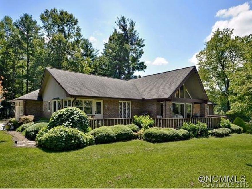 Wonderful home. Year round views of 6th green and the mountain beyond. Wrap around decks and sunroom. Large living room with vaulted ceiling, large, updated kitchen with granite, hardwoods throughout. Master Suite with quartz counters in Mbath. Family room, 4th bedroom and full bath downstairs. Whole house generator, Rinnai hot water, new gas furnace Jan 2015. Beautifully landscaped .9 acre level corner lot. This home is a must see!!!!
